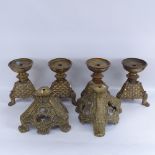 A set of 4 Antique cast-brass candle stands, with lion paw feet, and a pair of cast-brass lamp bases