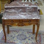 A French walnut washstand, with a brown marble raised and shaped back, 2 frieze drawers, raised on