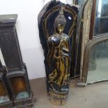 A relief carved painted and gilded deity figure, floor standing, H102cm