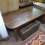 An Antique Continental refectory table, with stained beech plank top on oak base, L175cm, D92cm,