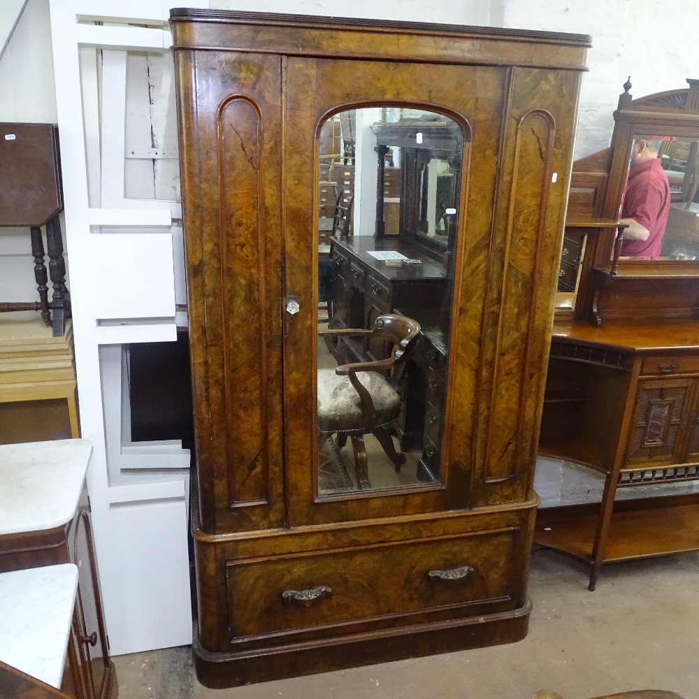 A Victorian walnut single-mirror door wardrobe with drawer fitted base, W112cm, H194cm, D48cm