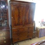 An 18th century mahogany 2-section linen press, W123cm, D55cm, H220cm