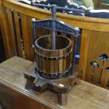 A French stained wood and cast-iron grape press, W33cm