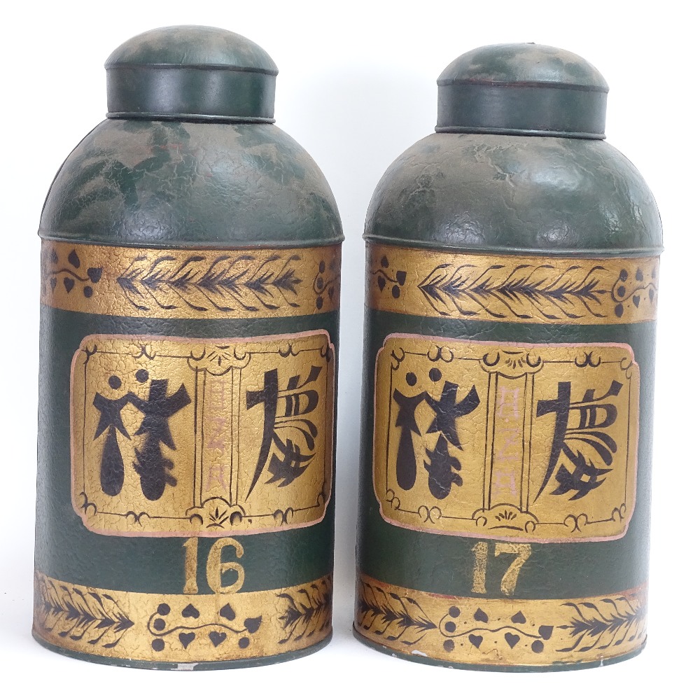 A pair of painted and gilded metal tea canisters, character mark decoration, probably mid-20th