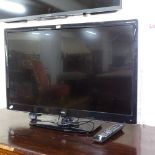 A Logik 32" flat screen television with remote, GWO