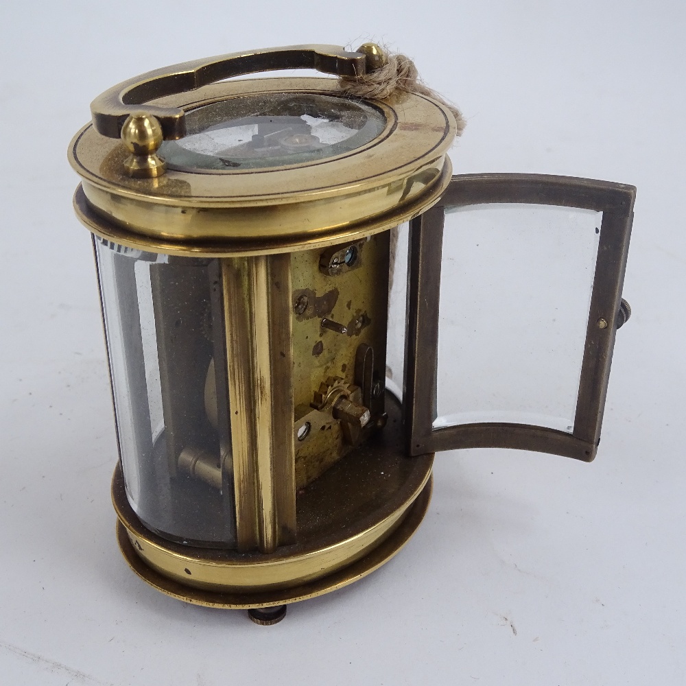 A Vintage Fobrux glazed cast-iron money bank, a Forum oval brass-cased carriage clock, and another - Image 2 of 3