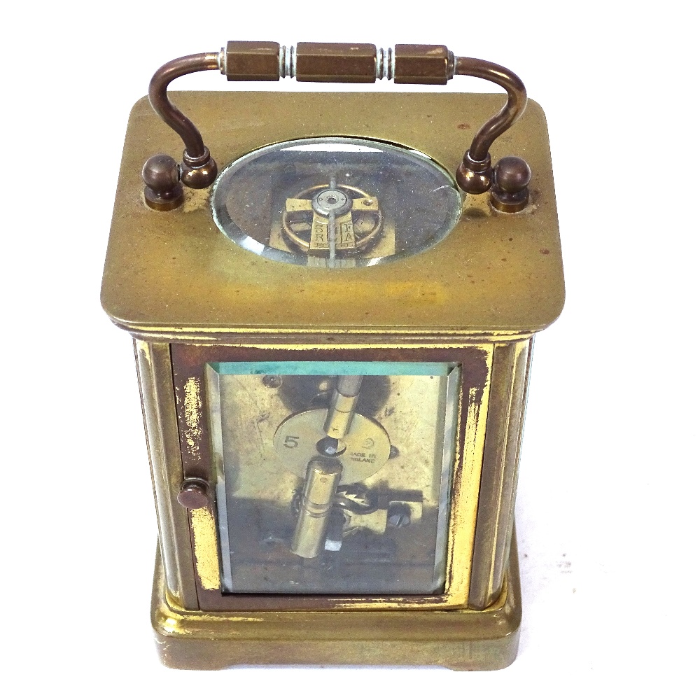 A brass-cased carriage clock, case height 11cm, not currently working, with key - Image 3 of 3