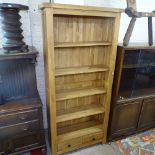 A good quality modern oak floor standing open bookcase, with 2 drawers to the base, W90cm, D30cm,