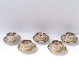 A set of 6 early 19th century English cups and 8 matching saucers, pattern no. 1033, with painted