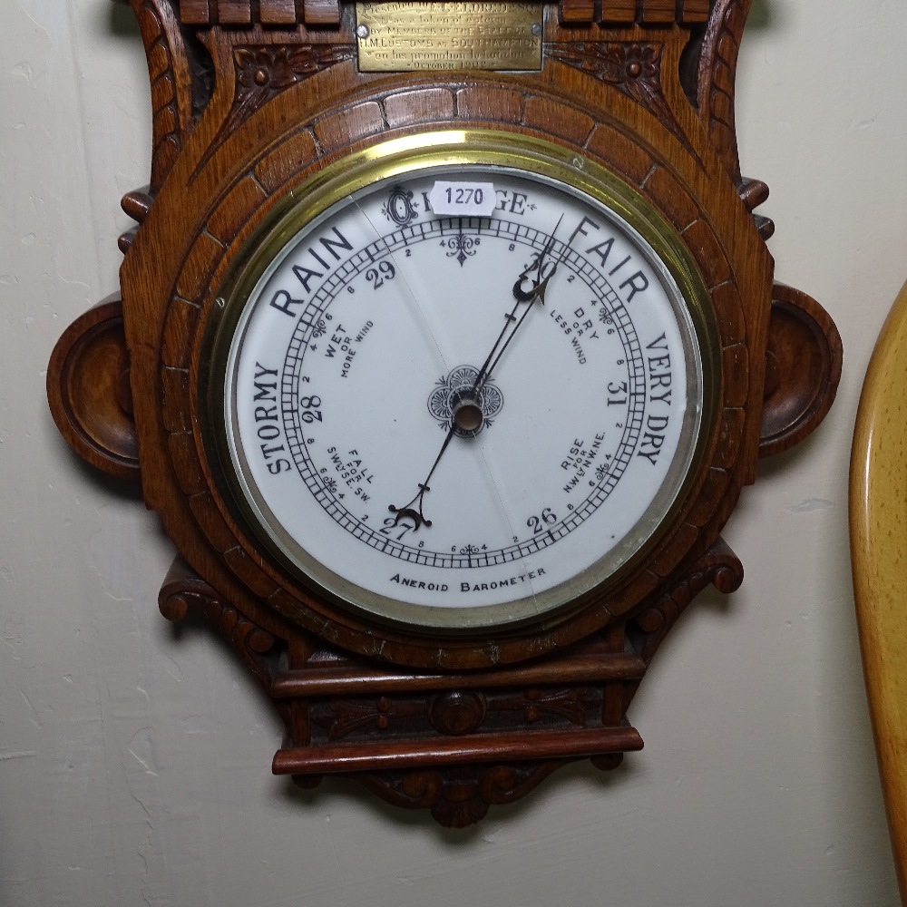 An Edwardian carved oak-cased aneroid wall barometer and thermometer, with brass presentation plaque - Image 2 of 3