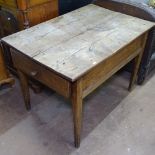 An Antique French elm kitchen table of rectangular form, with end-frieze drawer, raised on tapered