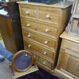 A modern pine tall chest of 2 short and 4 long drawers, W73cm, D43cm, H117cm, and a pine dressing