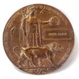 A First War Period bronze death plaque awarded to Peter Clark