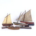Various Vintage wooden hulled pond yachts, largest length 29cm (4)