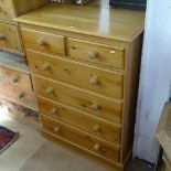 A modern polished pine chest of 2 short and 4 long drawers, W86cm, D43cm, H118cm