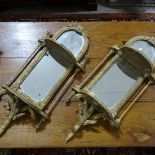A pair of 19th century gilt-gesso framed wall brackets with mirror backs, height 78cm Both mirrors