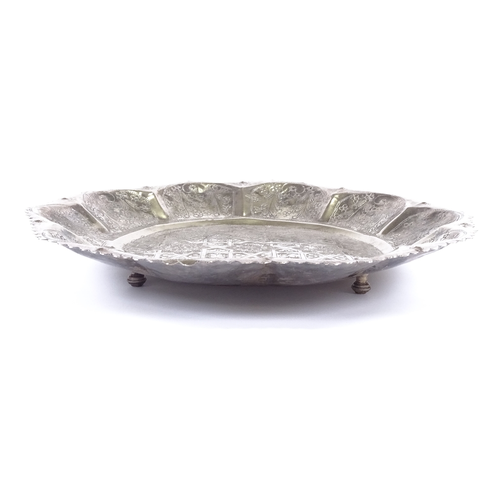 A large Indian white metal circular tray, floral swag and eternal knot decoration with scalloped - Image 3 of 4