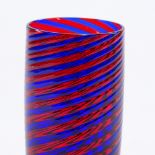 A blue and red glass spiral hand made cylinder vase, height 17cm. Scratches to base, surface dirt to