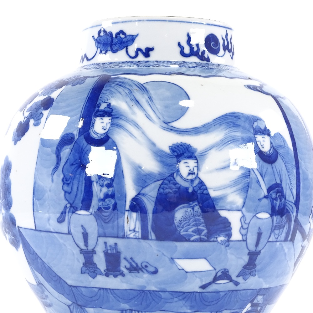 An antique Chinese blue and white bulbous vase, with hand painted court scene, possibly Kangxi,