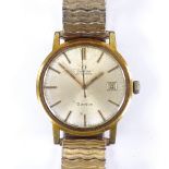 OMEGA - a Vintage gold plated stainless steel Geneve automatic wristwatch, silvered dial with gilt
