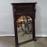 A 19th century carved oak-framed wall mirror with fluted columns, height 132cm, width 86cm