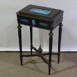 A 19th century ebonised jardiniere of rectangular form, the lid having an inset relief moulded