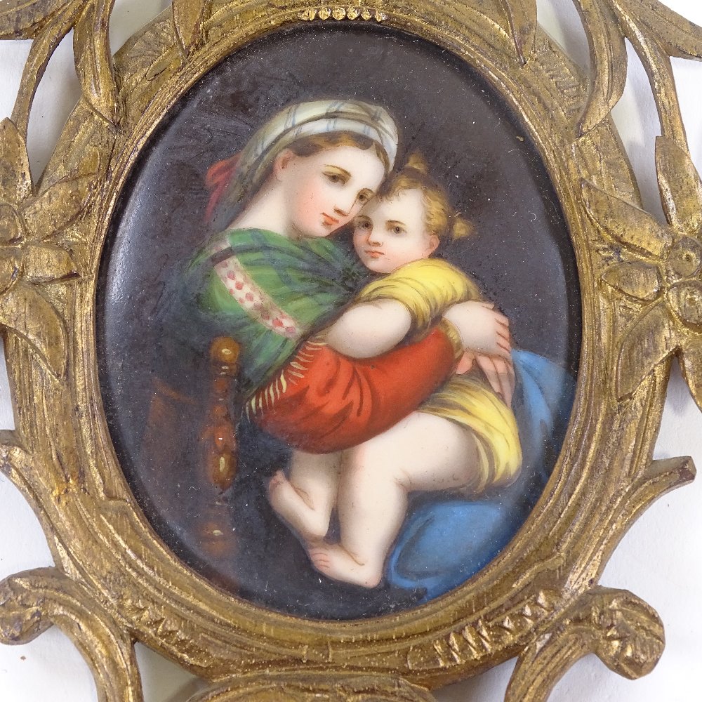 A 19th century painted porcelain plaque, depicting a woman and child in carved giltwood frame, - Image 2 of 5