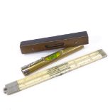 An ivory and nickel-mounted folding rule, a brass-mounted ebony spirit level and a brass-mounted