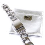 A large Dolce & Gabbana stainless steel D&G logo bracelet, thick flat curb links with central curved