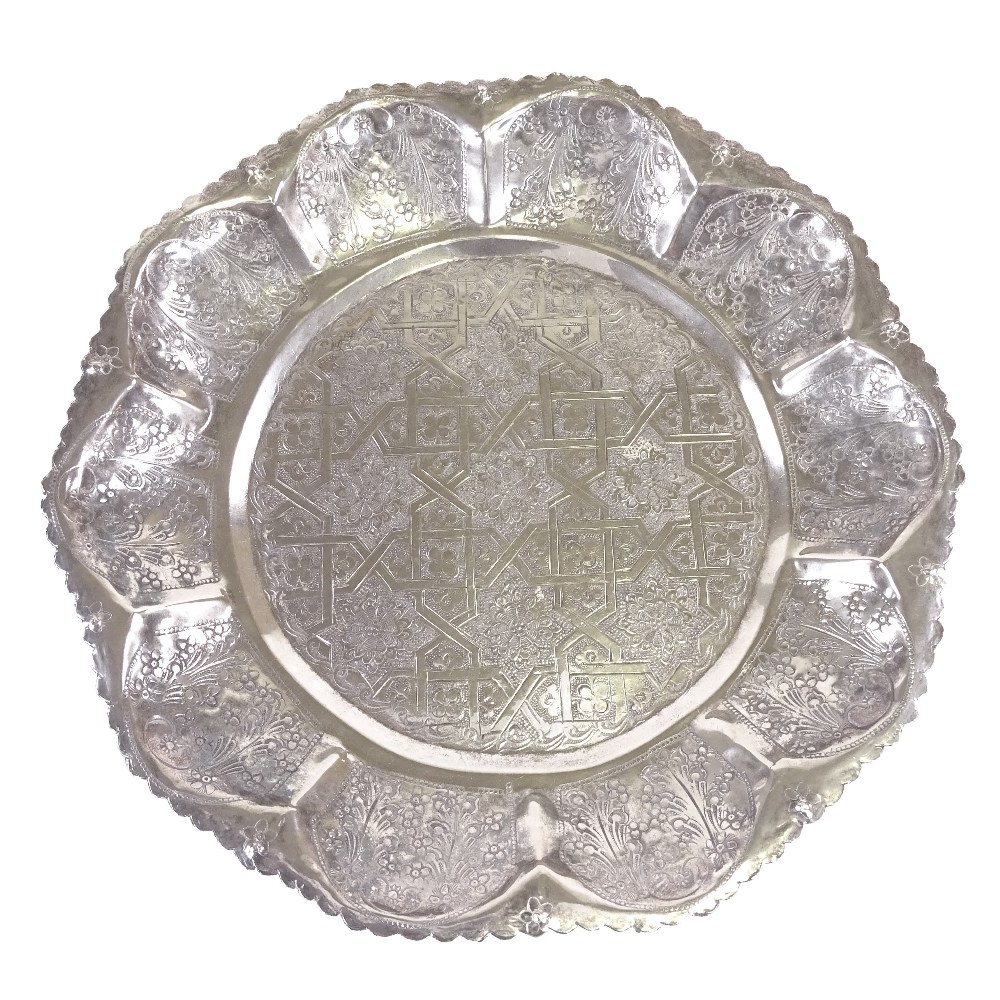 A large Indian white metal circular tray, floral swag and eternal knot decoration with scalloped - Image 2 of 4