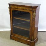 A Victorian burr-walnut and marquetry inlaid pier cabinet, with ormolu mouldings and mounts, width