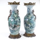 A pair of large 18th century Chinese enamelled porcelain vases, hand painted with extensive mountain