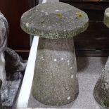 A weathered stone saddle stone, height 74cm, diameter 41cm Very good condition, nicely weathered all