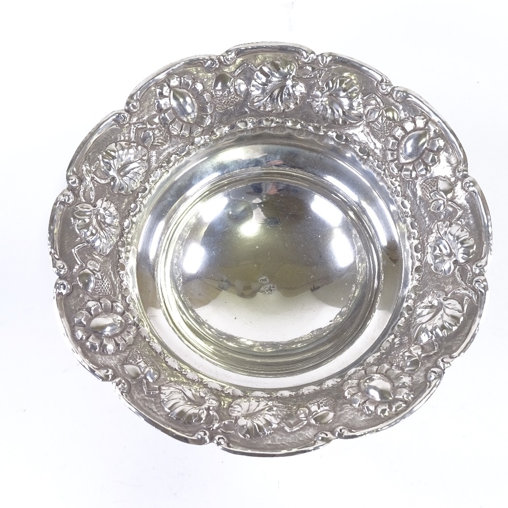 A sterling silver circular bon bon dish, relief embossed strawberry and leaf decoration with foliate - Image 2 of 4