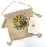 ROYAL INTEREST - a floral cross-stitch embroidered evening bag, together with a hand written note