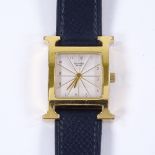 HERMES - a lady's gold plated stainless steel Heure H quartz wristwatch, ref. HH1.201, silvered