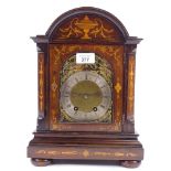 A French 18th century rosewood inlaid dome-top bracket clock, brass cherub and floral dial with