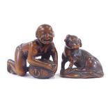 2 hardwood netsuke of a dog and a man with beaver, tallest 4cm Overall good condition, signatures to