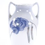 A Royal Copenhagen Art Nouveau style vase, with sweet pea decoration, height 33cm. Good Condition.