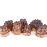 A collection of Victorian copper jelly moulds, largest length 21cm (7) Several minor dents on the