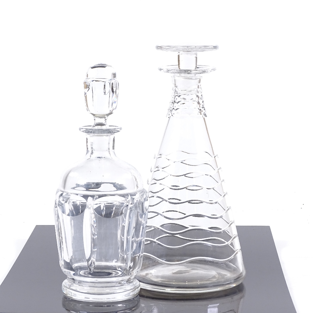 Two 20th century stylised glass decanters, tallest 25cm. Complete with no chips or cracks. Light