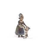 A Vienna cold painted bronze dutch girl with dog, height 5cm. Paint is heavily rubbed and chipped,