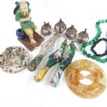 A group of Chinese items, ceramic figure, 3 glass mythical beasts, 2 hardstone discs, green stone