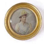 19th century miniature circular oil on board, portrait of a woman, unsigned, framed behind convex