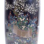 A fine Meiji period Japanese cloisonne baluster vase, dark blue body with Japanese garden