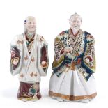 2 Japanese Meiji period polychrome porcelain figures, of actors wearing noh masks, tallest 23cm.