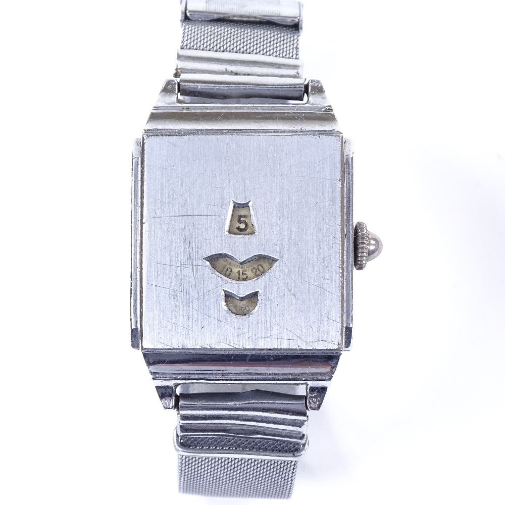 A Vintage stainless steel-cased Jump Hour mechanical wristwatch, 3 Arabic numeral apertures with