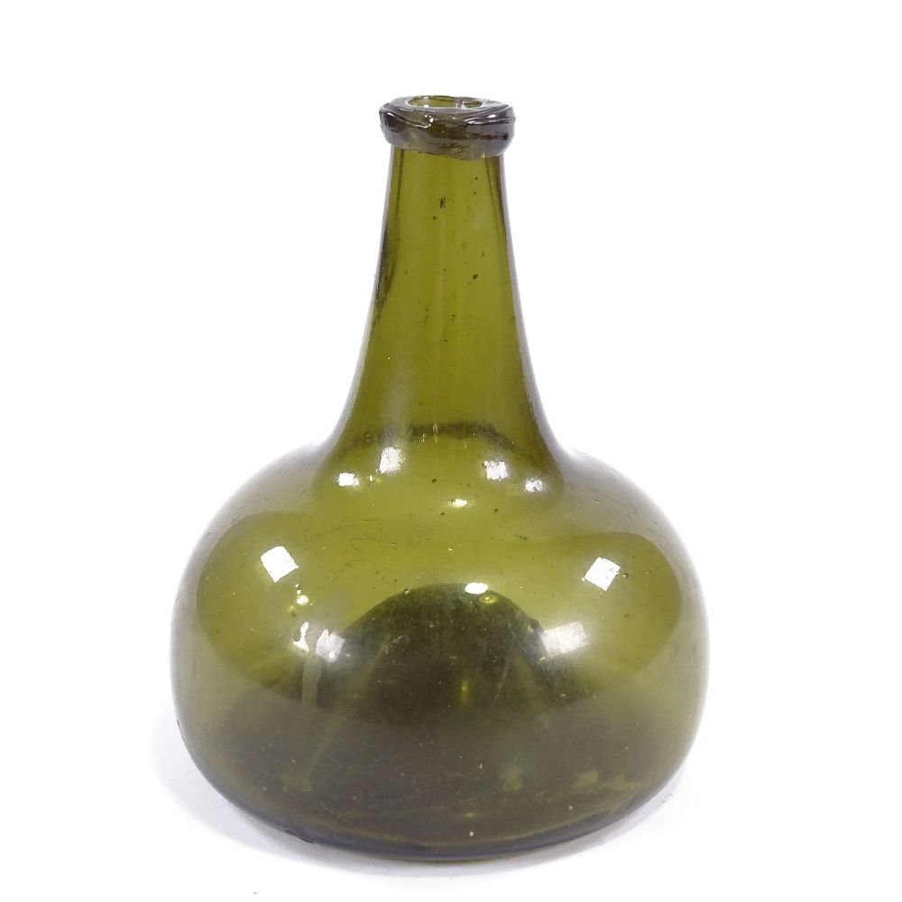 An 18th century handmade green glass onion-shaped bottle, height 17cm - Image 3 of 6