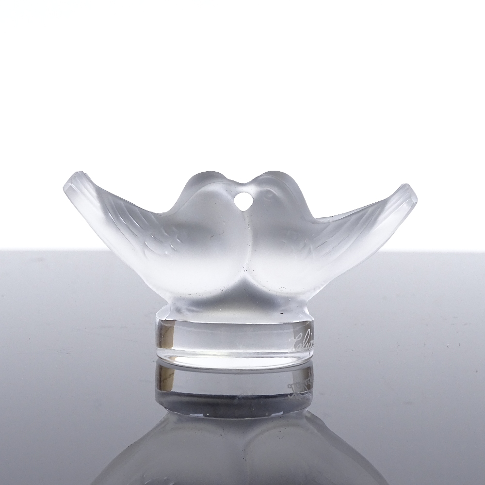 A Lalique kissing doves paperweight, length 7cm. In good condition, small scratches to the body,