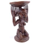 A Luba Caryatid carved wood Tribal stool, height 39cm